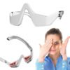 Frame-50-19.jpg Masseur Oculaire Anti-Cernes Électrique avec Lumière LED | Dispositif de Soin pour Yeux Fatigués et Cernes