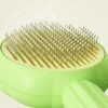 9dc412a6-e726-4e1e-9876-99580817ee01.jpg Brosse pour animaux auto nettoyante