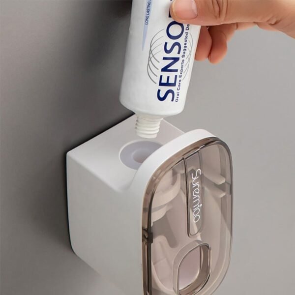 Distributeur de dentifrice mural a pression